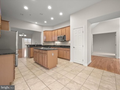 This luxury end unit townhome is nestled in an exceptional on Waverly Woods Golf Club in Maryland - for sale on GolfHomes.com, golf home, golf lot