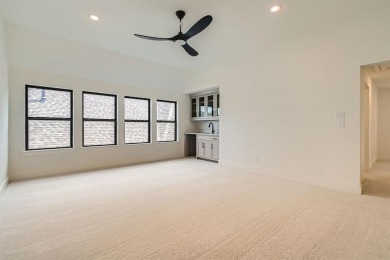 Experience luxury living in a picturesque location! This custom on The Tribute At the Colony in Texas - for sale on GolfHomes.com, golf home, golf lot
