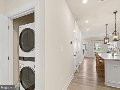 Welcome to this like-new, beautifully maintained townhome on The Peninsula Golf and Country Club in Delaware - for sale on GolfHomes.com, golf home, golf lot
