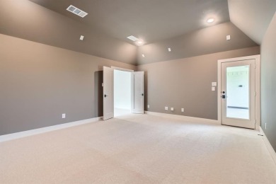 Experience luxury living in a picturesque location! This custom on The Tribute At the Colony in Texas - for sale on GolfHomes.com, golf home, golf lot