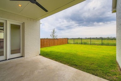 Experience luxury living in a picturesque location! This custom on The Tribute At the Colony in Texas - for sale on GolfHomes.com, golf home, golf lot