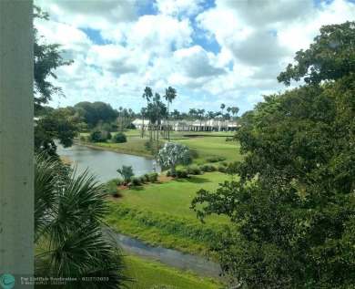 EXTRA LARGE 1568 SQ/FT TASTEFULLY RENOVATED CORNER UNIT WITH on Wynmoor Golf Course in Florida - for sale on GolfHomes.com, golf home, golf lot