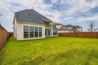 Experience luxury living in a picturesque location! This custom on The Tribute At the Colony in Texas - for sale on GolfHomes.com, golf home, golf lot