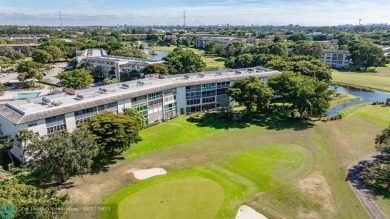 EXTRA LARGE 1568 SQ/FT TASTEFULLY RENOVATED CORNER UNIT WITH on Wynmoor Golf Course in Florida - for sale on GolfHomes.com, golf home, golf lot