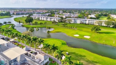 EXTRA LARGE 1568 SQ/FT TASTEFULLY RENOVATED CORNER UNIT WITH on Wynmoor Golf Course in Florida - for sale on GolfHomes.com, golf home, golf lot