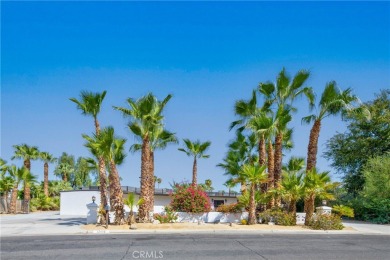 Step into this historic, single-level home in Rancho Mirage on Rancho Las Palmas Country Club in California - for sale on GolfHomes.com, golf home, golf lot