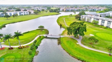 EXTRA LARGE 1568 SQ/FT TASTEFULLY RENOVATED CORNER UNIT WITH on Wynmoor Golf Course in Florida - for sale on GolfHomes.com, golf home, golf lot