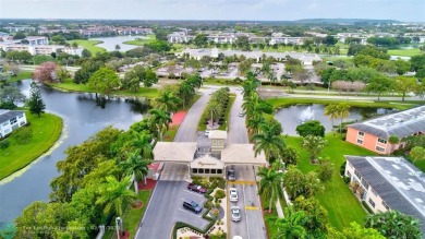 EXTRA LARGE 1568 SQ/FT TASTEFULLY RENOVATED CORNER UNIT WITH on Wynmoor Golf Course in Florida - for sale on GolfHomes.com, golf home, golf lot