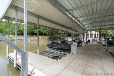 Welcome to your lakefront dream retreat! This immaculate on The Club At Old Kinderhook in Missouri - for sale on GolfHomes.com, golf home, golf lot