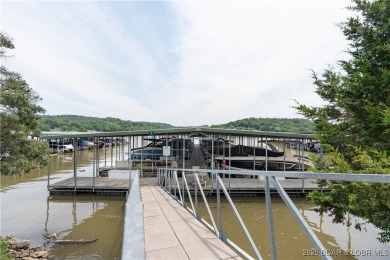 Welcome to your lakefront dream retreat! This immaculate on The Club At Old Kinderhook in Missouri - for sale on GolfHomes.com, golf home, golf lot