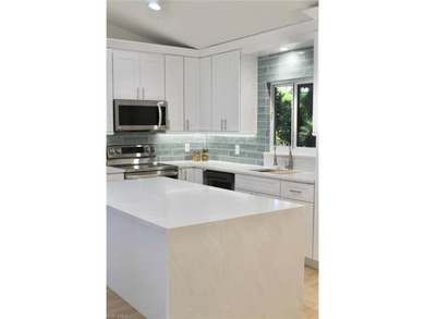 Totally updated property...! This home has been meticulously on The Colony Golf and Country Club in Florida - for sale on GolfHomes.com, golf home, golf lot