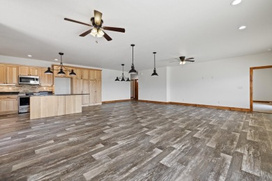 Listed by Lonnie Doney, KWBH, . Nestled in Boulder Falls on Southern Hills Golf Course in South Dakota - for sale on GolfHomes.com, golf home, golf lot