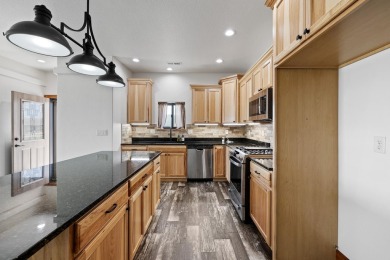 Listed by Lonnie Doney, KWBH, . Nestled in Boulder Falls on Southern Hills Golf Course in South Dakota - for sale on GolfHomes.com, golf home, golf lot