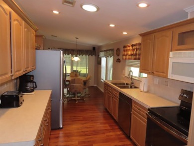 This move in ready 1605 sf split 3/2 home is offered for $169 on Crane Lakes Golf and Country Club in Florida - for sale on GolfHomes.com, golf home, golf lot