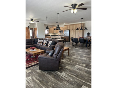 Listed by Lonnie Doney, KWBH, . Nestled in Boulder Falls on Southern Hills Golf Course in South Dakota - for sale on GolfHomes.com, golf home, golf lot