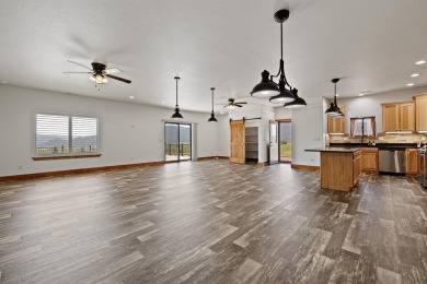 Listed by Lonnie Doney, KWBH, . Nestled in Boulder Falls on Southern Hills Golf Course in South Dakota - for sale on GolfHomes.com, golf home, golf lot