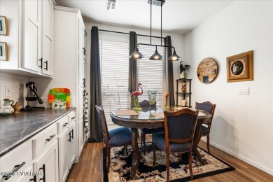 This 55+ community home features a beautifully appointed kitchen on Pine Shadows Golf Course in Arizona - for sale on GolfHomes.com, golf home, golf lot