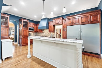 This stunning 1.5-story home is perfectly set on a scenic golf on Falcon Ridge Golf Course in Kansas - for sale on GolfHomes.com, golf home, golf lot