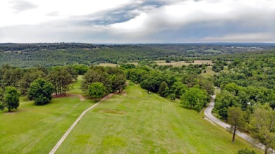 Nestled among impressive oaks and pines this beautifully on Oakridge Golf Course in Arkansas - for sale on GolfHomes.com, golf home, golf lot