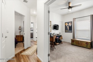 This 55+ community home features a beautifully appointed kitchen on Pine Shadows Golf Course in Arizona - for sale on GolfHomes.com, golf home, golf lot