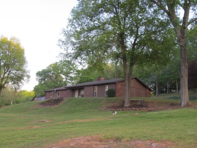 Nestled among impressive oaks and pines this beautifully on Oakridge Golf Course in Arkansas - for sale on GolfHomes.com, golf home, golf lot