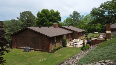 Nestled among impressive oaks and pines this beautifully on Oakridge Golf Course in Arkansas - for sale on GolfHomes.com, golf home, golf lot