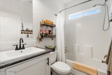 This 55+ community home features a beautifully appointed kitchen on Pine Shadows Golf Course in Arizona - for sale on GolfHomes.com, golf home, golf lot