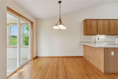 Enjoy one-level living in this end-unit townhome situated on a on Golf at the Legacy in Minnesota - for sale on GolfHomes.com, golf home, golf lot