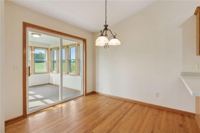 Enjoy one-level living in this end-unit townhome situated on a on Golf at the Legacy in Minnesota - for sale on GolfHomes.com, golf home, golf lot