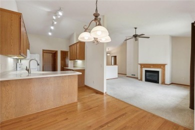 Enjoy one-level living in this end-unit townhome situated on a on Golf at the Legacy in Minnesota - for sale on GolfHomes.com, golf home, golf lot