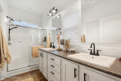 This 55+ community home features a beautifully appointed kitchen on Pine Shadows Golf Course in Arizona - for sale on GolfHomes.com, golf home, golf lot