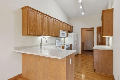 Enjoy one-level living in this end-unit townhome situated on a on Golf at the Legacy in Minnesota - for sale on GolfHomes.com, golf home, golf lot