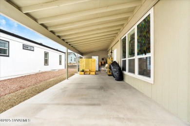 This 55+ community home features a beautifully appointed kitchen on Pine Shadows Golf Course in Arizona - for sale on GolfHomes.com, golf home, golf lot