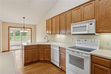 Enjoy one-level living in this end-unit townhome situated on a on Golf at the Legacy in Minnesota - for sale on GolfHomes.com, golf home, golf lot