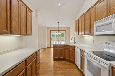 Enjoy one-level living in this end-unit townhome situated on a on Golf at the Legacy in Minnesota - for sale on GolfHomes.com, golf home, golf lot
