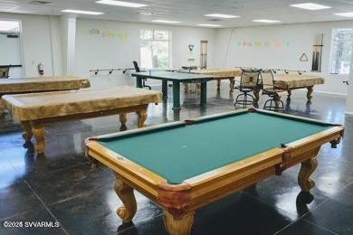 This 55+ community home features a beautifully appointed kitchen on Pine Shadows Golf Course in Arizona - for sale on GolfHomes.com, golf home, golf lot
