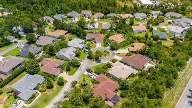 This one level Panama City Beach Florida home is nestled in on Bay Point Resort Golf Club in Florida - for sale on GolfHomes.com, golf home, golf lot