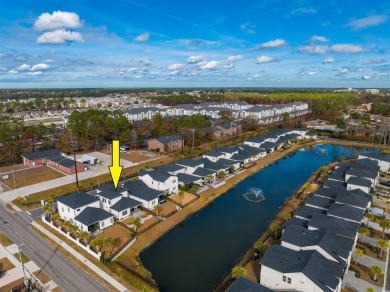 Nestled in a serene gated community with breathtaking views of a on Cane Patch Driving Range in South Carolina - for sale on GolfHomes.com, golf home, golf lot