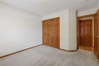Enjoy one-level living in this end-unit townhome situated on a on Golf at the Legacy in Minnesota - for sale on GolfHomes.com, golf home, golf lot