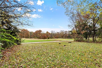 This stunning 1.5-story home is perfectly set on a scenic golf on Falcon Ridge Golf Course in Kansas - for sale on GolfHomes.com, golf home, golf lot