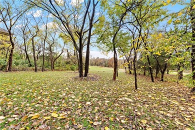 This stunning 1.5-story home is perfectly set on a scenic golf on Falcon Ridge Golf Course in Kansas - for sale on GolfHomes.com, golf home, golf lot