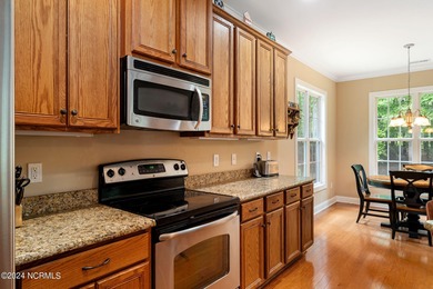 Welcome to 227 October Drive, a charming Craftsman-style home on River Landing Golf Course in North Carolina - for sale on GolfHomes.com, golf home, golf lot