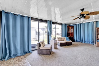Live the dream in this beautifully updated 2BR/2BA home in on Barefoot Bay Golf Course in Florida - for sale on GolfHomes.com, golf home, golf lot