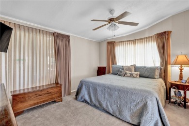 Live the dream in this beautifully updated 2BR/2BA home in on Barefoot Bay Golf Course in Florida - for sale on GolfHomes.com, golf home, golf lot