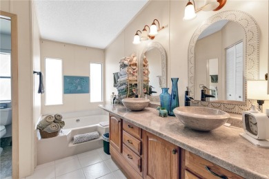 Live the dream in this beautifully updated 2BR/2BA home in on Barefoot Bay Golf Course in Florida - for sale on GolfHomes.com, golf home, golf lot
