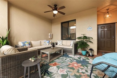 Social membership is included with this stunning first-floor on Bonita National Golf Course in Florida - for sale on GolfHomes.com, golf home, golf lot