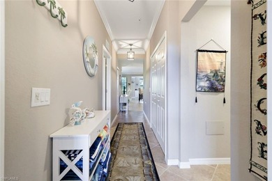 Social membership is included with this stunning first-floor on Bonita National Golf Course in Florida - for sale on GolfHomes.com, golf home, golf lot