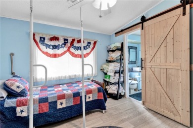 Live the dream in this beautifully updated 2BR/2BA home in on Barefoot Bay Golf Course in Florida - for sale on GolfHomes.com, golf home, golf lot