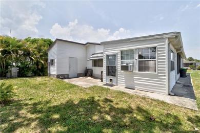 Live the dream in this beautifully updated 2BR/2BA home in on Barefoot Bay Golf Course in Florida - for sale on GolfHomes.com, golf home, golf lot