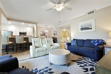 Social membership is included with this stunning first-floor on Bonita National Golf Course in Florida - for sale on GolfHomes.com, golf home, golf lot